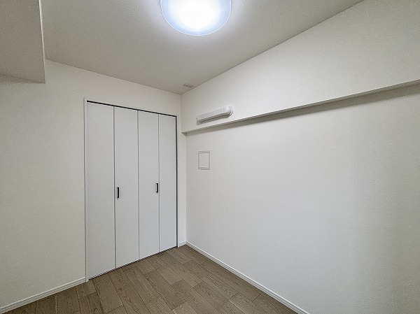 月島ホームズ_クローゼット付きの洋室の写真 