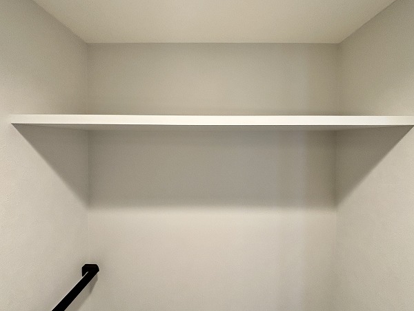 月島ホームズ_トイレ収納の写真 