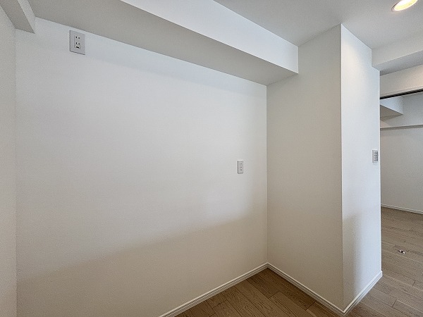 月島ホームズ_キッチン背面の写真 