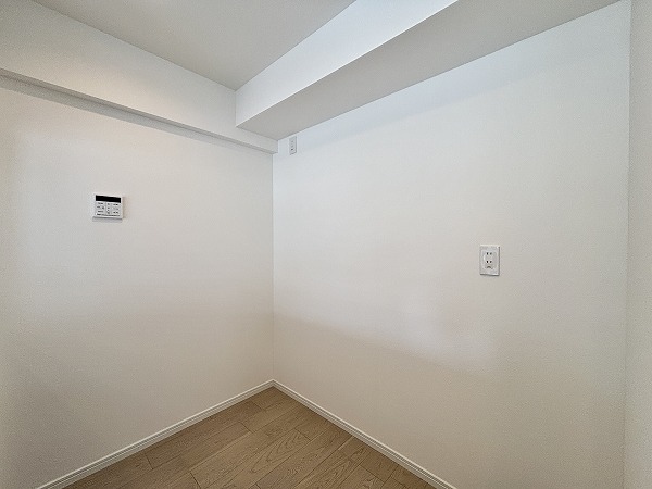 月島ホームズ_キッチン背面の写真1 