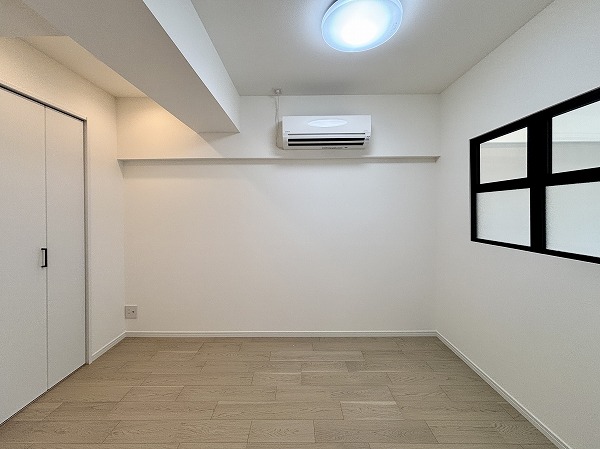 月島ホームズ_お洒落な洋室の写真 