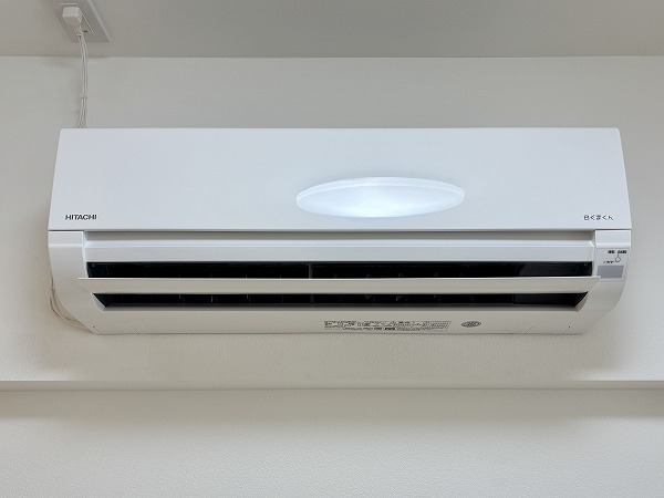 月島ホームズ_洋室エアコンの写真 