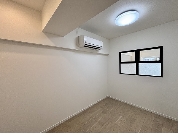 月島ホームズ_コンパクトな洋室の写真 