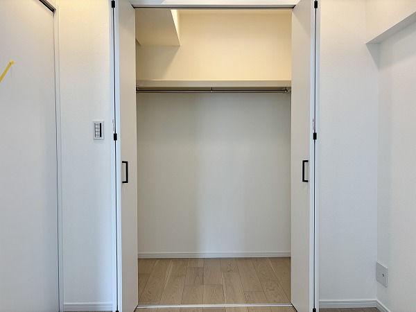 月島ホームズ_ウォークインクローゼットの写真 