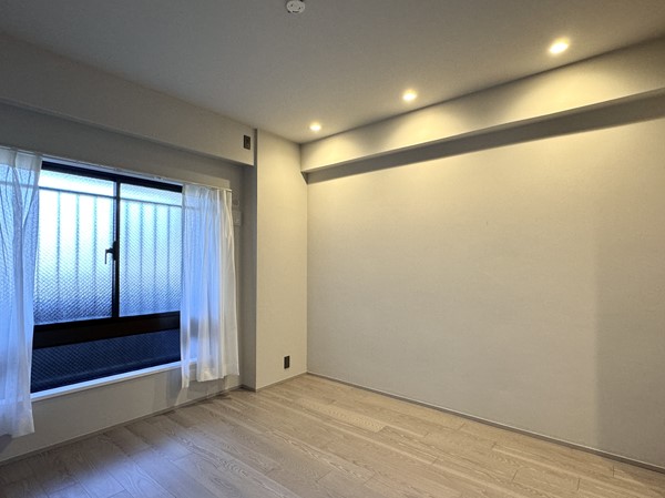 三田シティハウス_寝室の写真