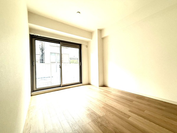 亀戸リリエンハイム_フローリング仕様の洋室の写真