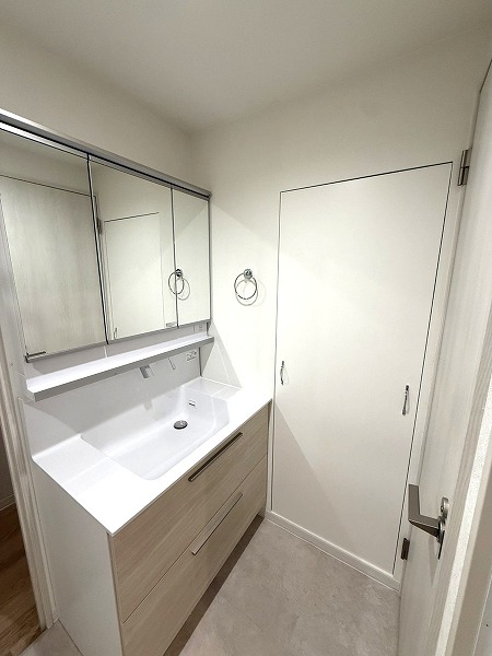 亀戸リリエンハイム_清潔感あるサニタリールームの写真