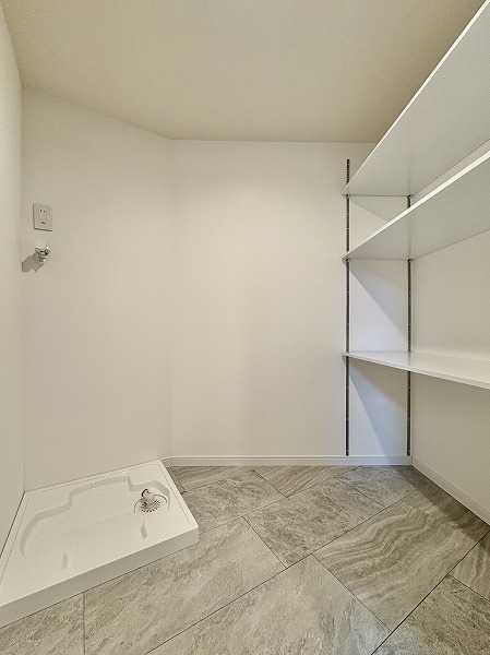 駒留マンション_ランドリースペースの写真