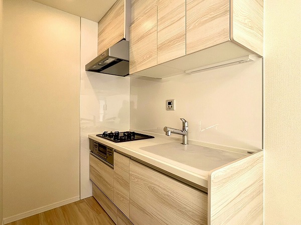 荻窪サニーガーデン_木目調のキッチンの写真